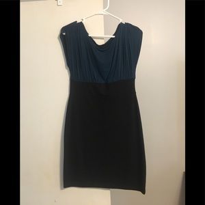 Super cute form fitting blue and black dress